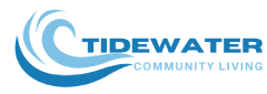 A logo with the text "TIDEWATER COMMUNITY LIVING" in front of a stylized wave.